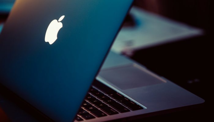 MacBook Pro on black surface