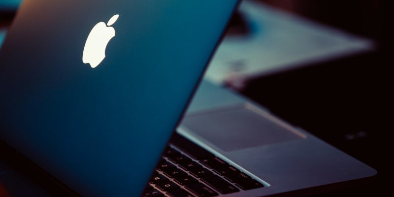 MacBook Pro on black surface