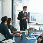 Salesperson talking with a modern buyer during a training inspired conversation