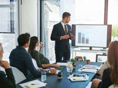 Salesperson talking with a modern buyer during a training inspired conversation